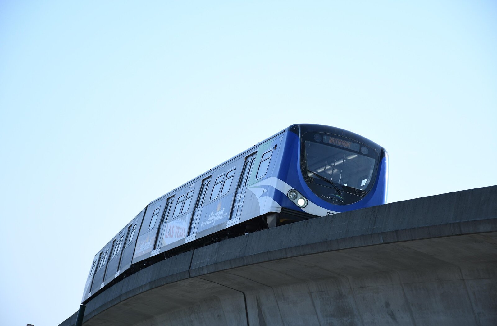 Elevated monorail against a clear sky