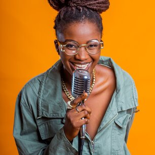 Singer performing into a vintage microphone