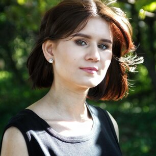 Outdoor portrait of a woman with a bob haircut